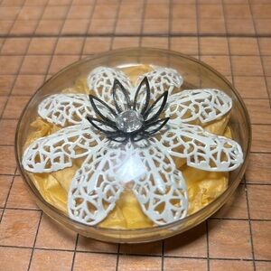 MCM Brooch White Enamel Filigree Black Flower Clear Gem Center Rolling Pin Clasp